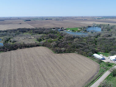 An aerial view taken at 400 feet above a gamebird operation shows potential risk factors including ponds and streams.